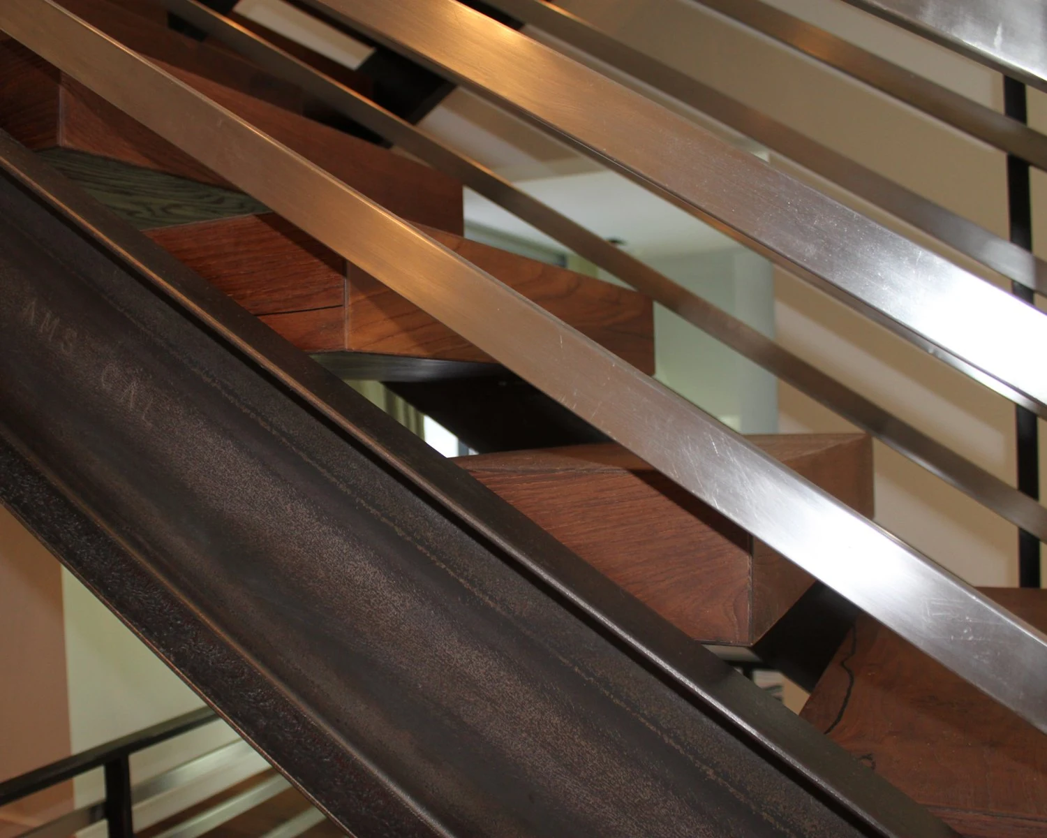 Steel-and-wood staircase tread detail
