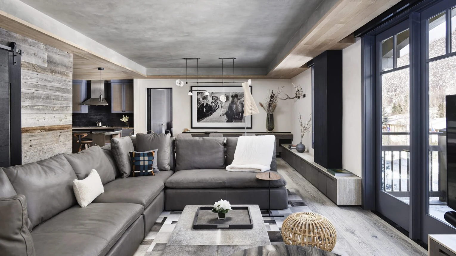 Living room with wood finishes and a stone fireplace